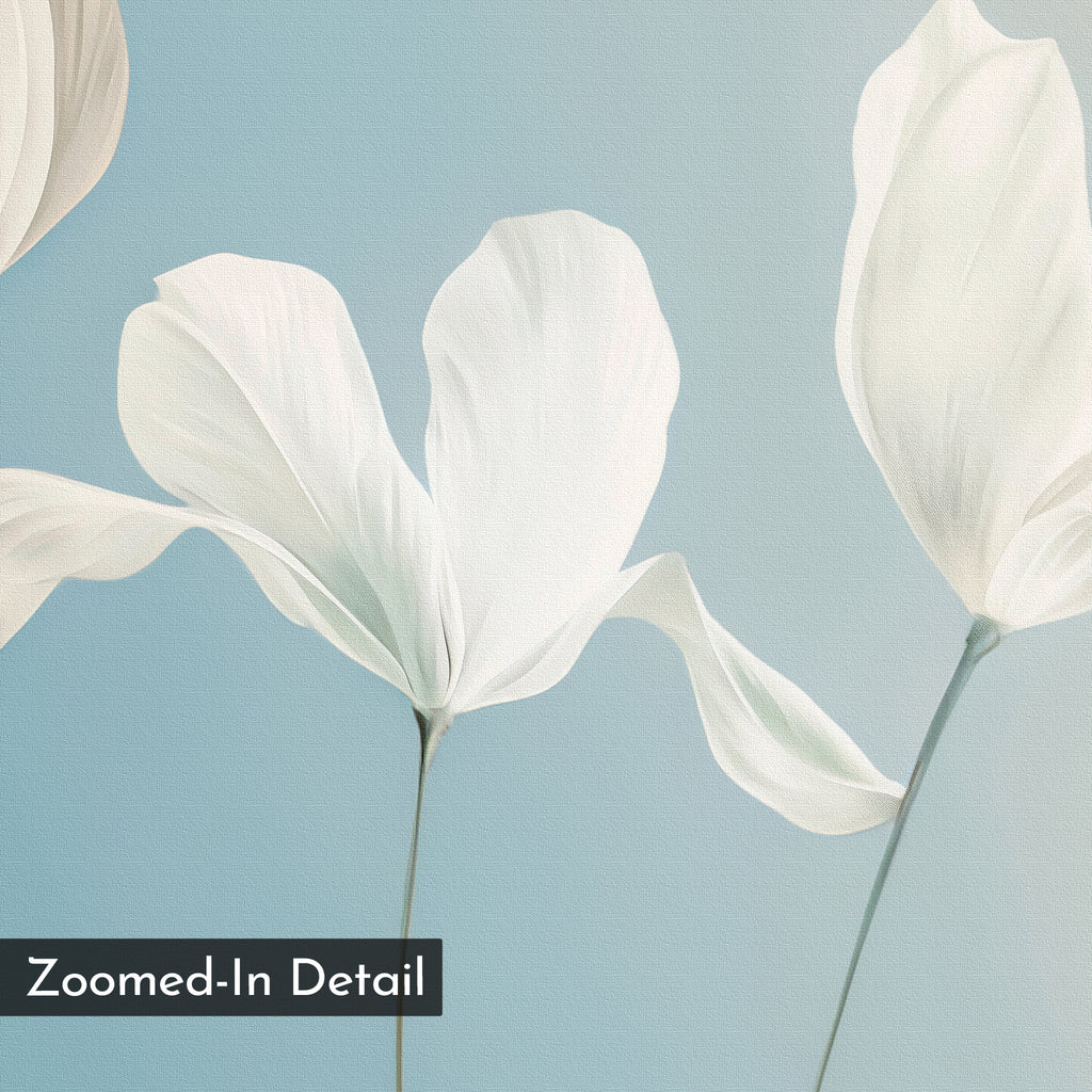 A close-up of three white flowers with delicate petals on thin stems appears against a soft blue gradient background in Stellar Flora Abstract Canvas Art. Minimalist wall art with "Zoomed-In Detail" labeled at the bottom left.