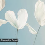 A close-up of three white flowers with delicate petals on thin stems appears against a soft blue gradient background in Stellar Flora Abstract Canvas Art. Minimalist wall art with "Zoomed-In Detail" labeled at the bottom left.