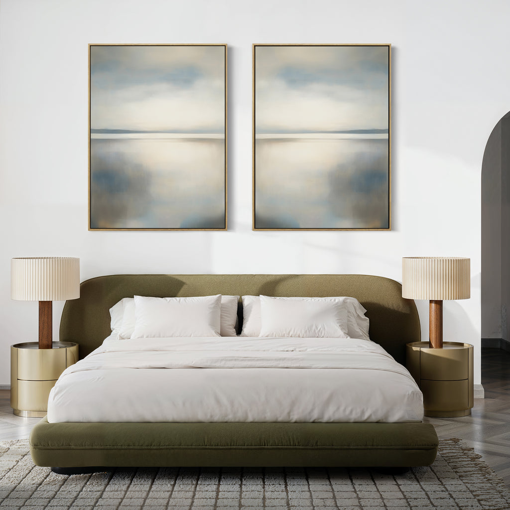 A modern bedroom with a low green bed, white bedding, beige nightstands and lamps, and the Still Horizon Set of 2 art above the bed. A neutral palette and textured rug complete this calming, contemporary retreat.