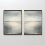 The Still Horizon Set of 2 features framed abstract landscape paintings in soft, muted tones, depicting calm seascapes that evoke serene horizons and tranquil water—perfect minimalist wall art for a peaceful ambiance.