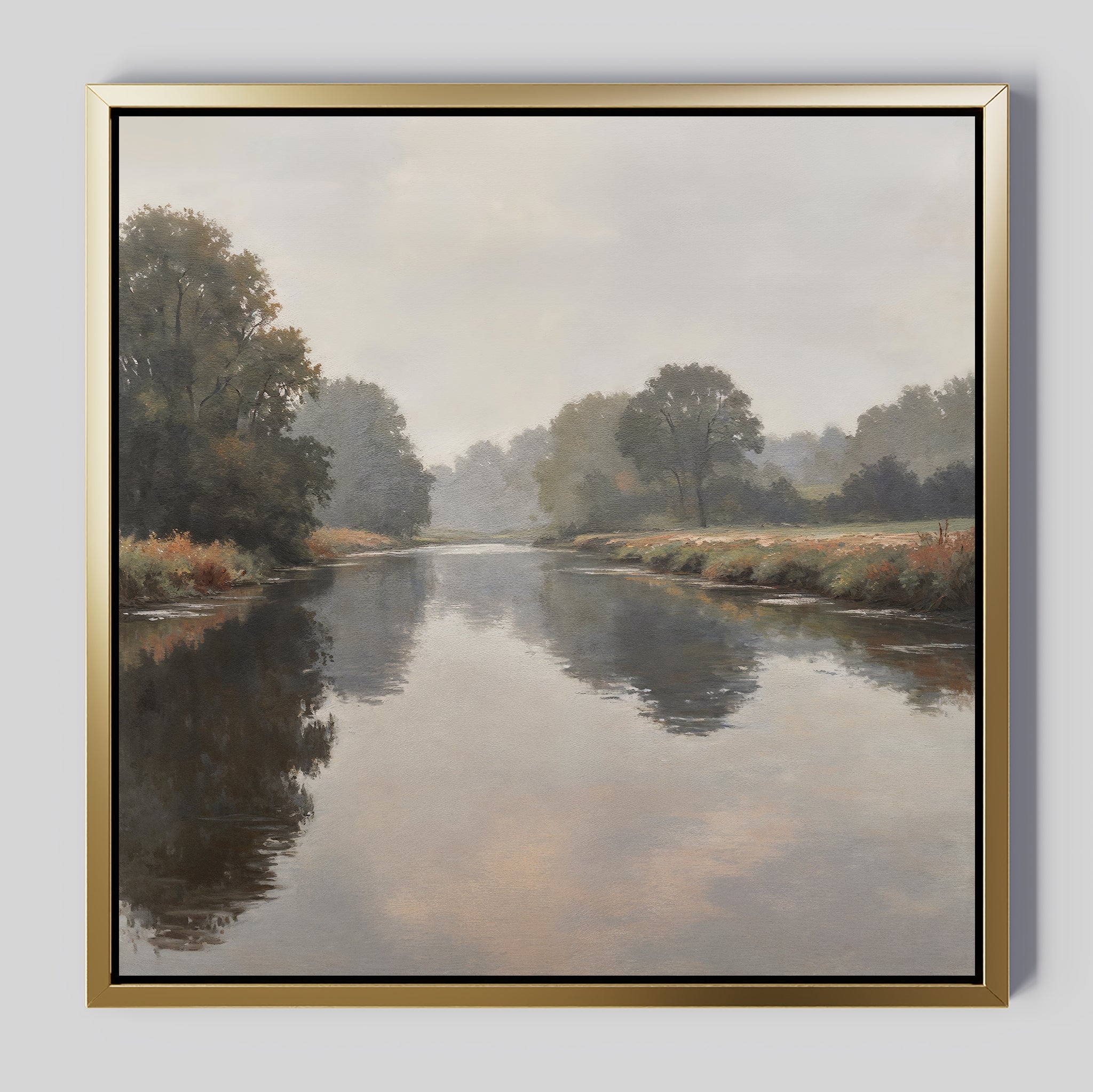 Still Riverbank Canvas Art features a tranquil river mirroring trees and a cloudy sky, with misty grassy banks. This minimalist framed wall art brings peaceful, serene vibes—ideal for creating a calming bedroom atmosphere.