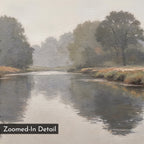 A tranquil river reflects lush trees and greenery beneath a misty sky. The image features a “Zoomed-In Detail” label in the corner—ideal as the Still Riverbank Canvas Art wall print.