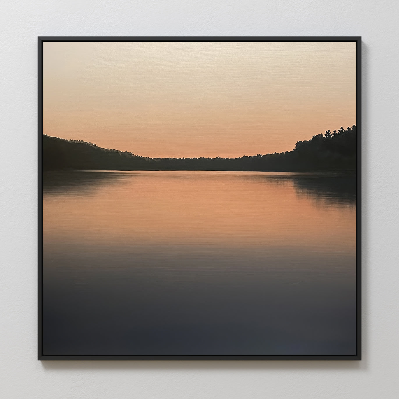 The Still Waters Canvas Art features a serene lake at sunset with tree silhouettes and soft orange-blue tones, making it perfect peaceful wall art for your living room decor.