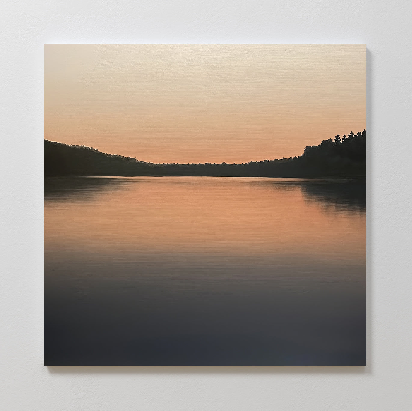 The Still Waters Canvas Art features a minimalist painting of a calm lake at sunset, with warm orange tones, dark tree silhouettes, and smooth water reflections—ideal peaceful wall art for your living room decor.