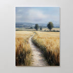 Sunlit Passage Canvas Art features a nature-inspired print of a winding dirt path through golden wheat fields, two trees, and distant hills beneath soft clouds—ideal minimalist wall art for creating a tranquil, welcoming space.
