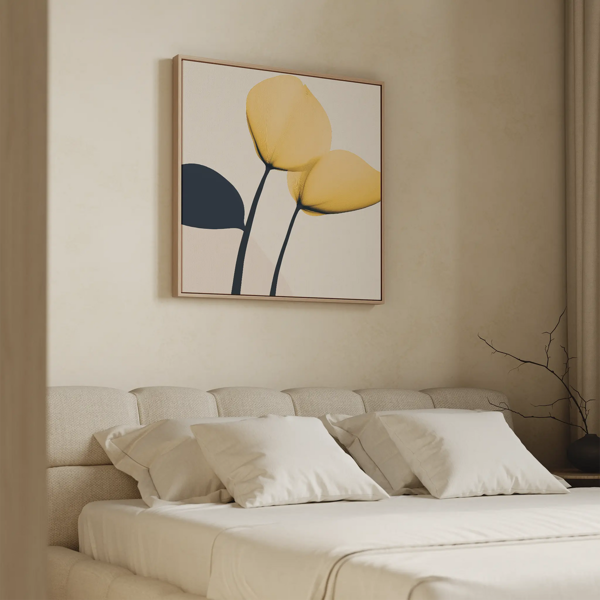 A minimalist bedroom features a beige upholstered bed, white pillows, and the Sunny Flora Canvas Art above the headboard, showcasing three abstract yellow and blue leaves on a light background.