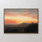 Sunset Reflection Canvas Art: A framed wall decor featuring a serene landscape with distant hills in warm orange and pink hues, and a dark foreground of trees—perfect vintage-inspired artwork for any space.