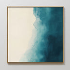Teal Tide Canvas Art: modern wall art with a gold frame, showcasing a gradient from creamy white to deep blue in soft, cloudy transitions—ideal for any space.