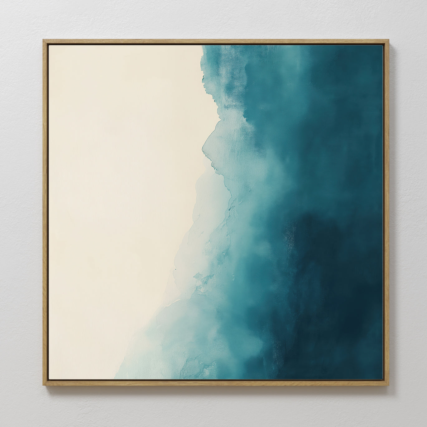 Teal Tide Canvas Art: modern wall art with a gold frame, showcasing a gradient from creamy white to deep blue in soft, cloudy transitions—ideal for any space.