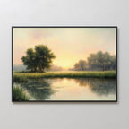 The Journey Canvas Art is a framed painting of serene trees and tall grass by a calm river at sunrise, with golden light on the water—ideal rustic wall art to enhance your countryside decor.