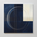 The Orbit Canvas Art features a dark blue and off-white color block background, accented by silver and white overlapping circles and vertical lines, creating striking minimalist wall art for modern home decor.