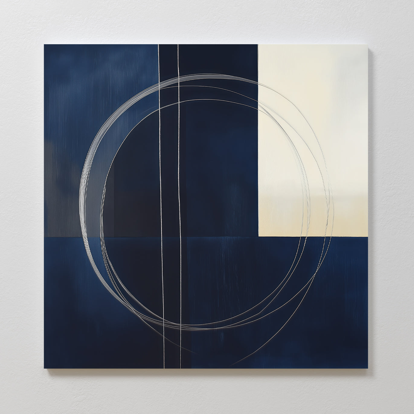 The Orbit Canvas Art features a dark blue and off-white color block background, accented by silver and white overlapping circles and vertical lines, creating striking minimalist wall art for modern home decor.