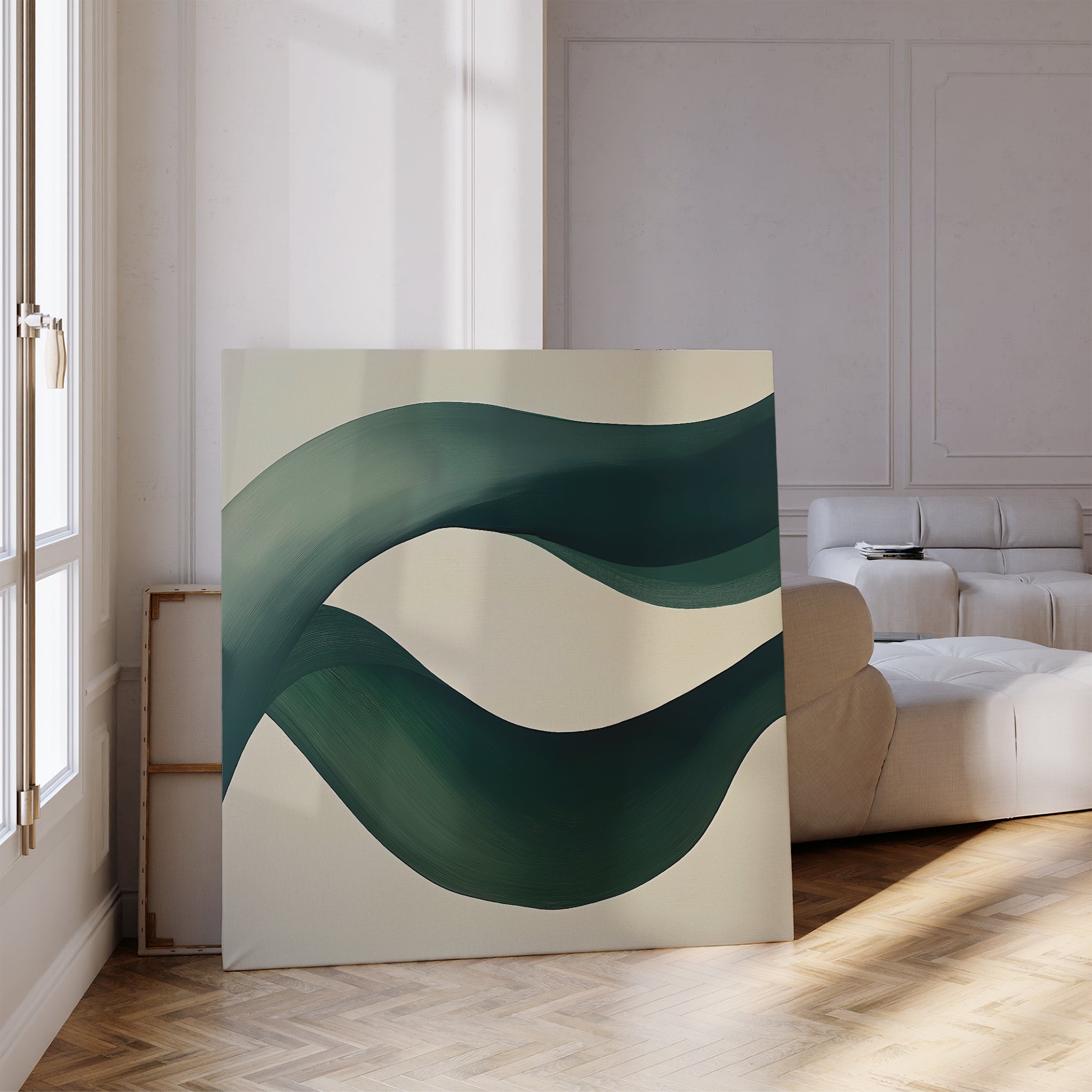 The Tidal Grace Canvas Art, with sweeping green and blue curves, is displayed against a wall in a bright modern living room featuring parquet floors and a white sofa.