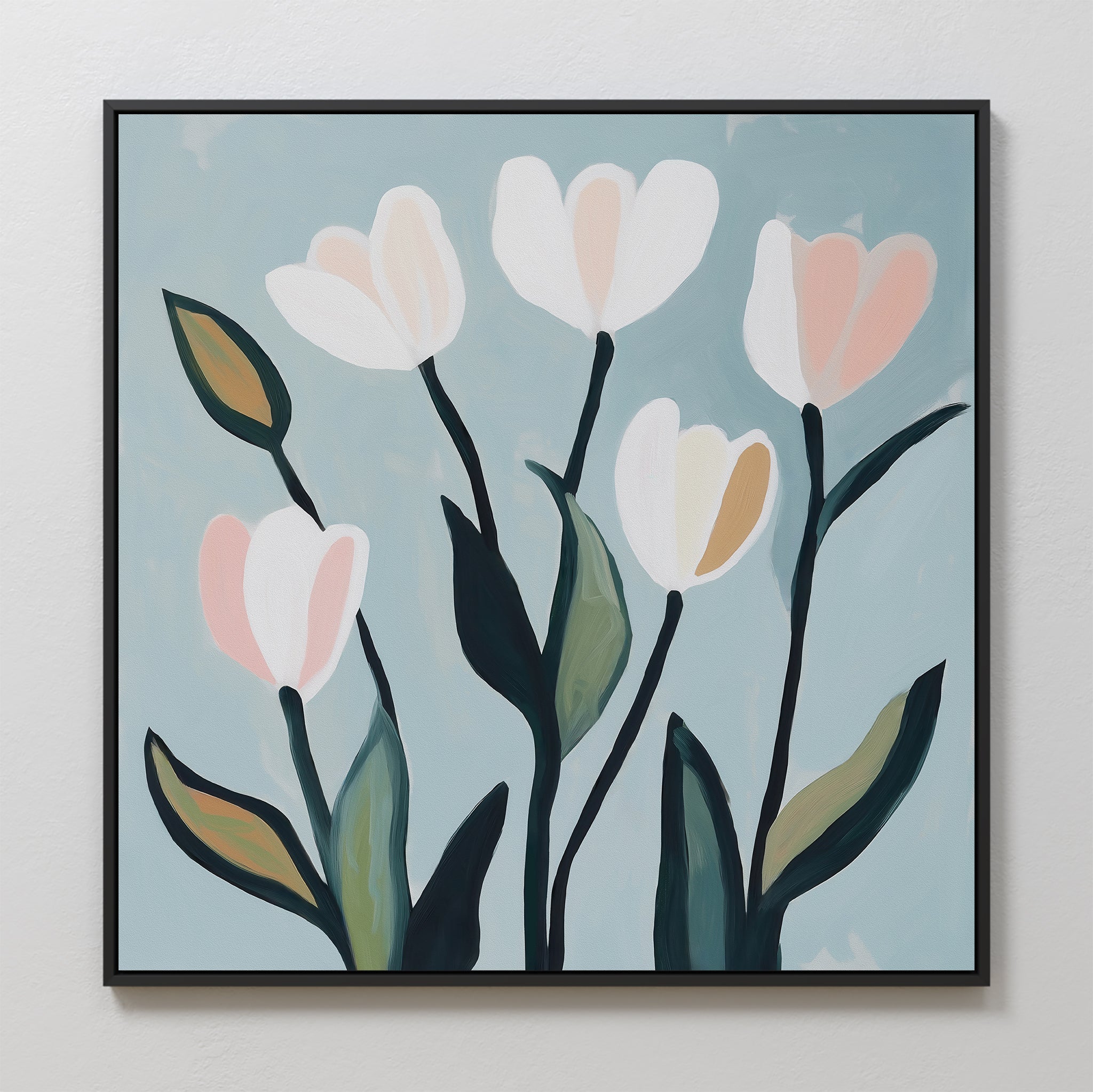 Tulip Harmony Canvas Art features five tulips with pale pink and white petals and green leaves on a light blue background in a thin black frame—ideal minimalist wall decor for a stylish living room.