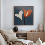 A modern living room with a beige sofa, neutral cushions, a wooden sideboard, and striking wall art—a framed Twin Blooms Canvas Art featuring abstract calla lilies on blue—brings Nordic Park style to life.