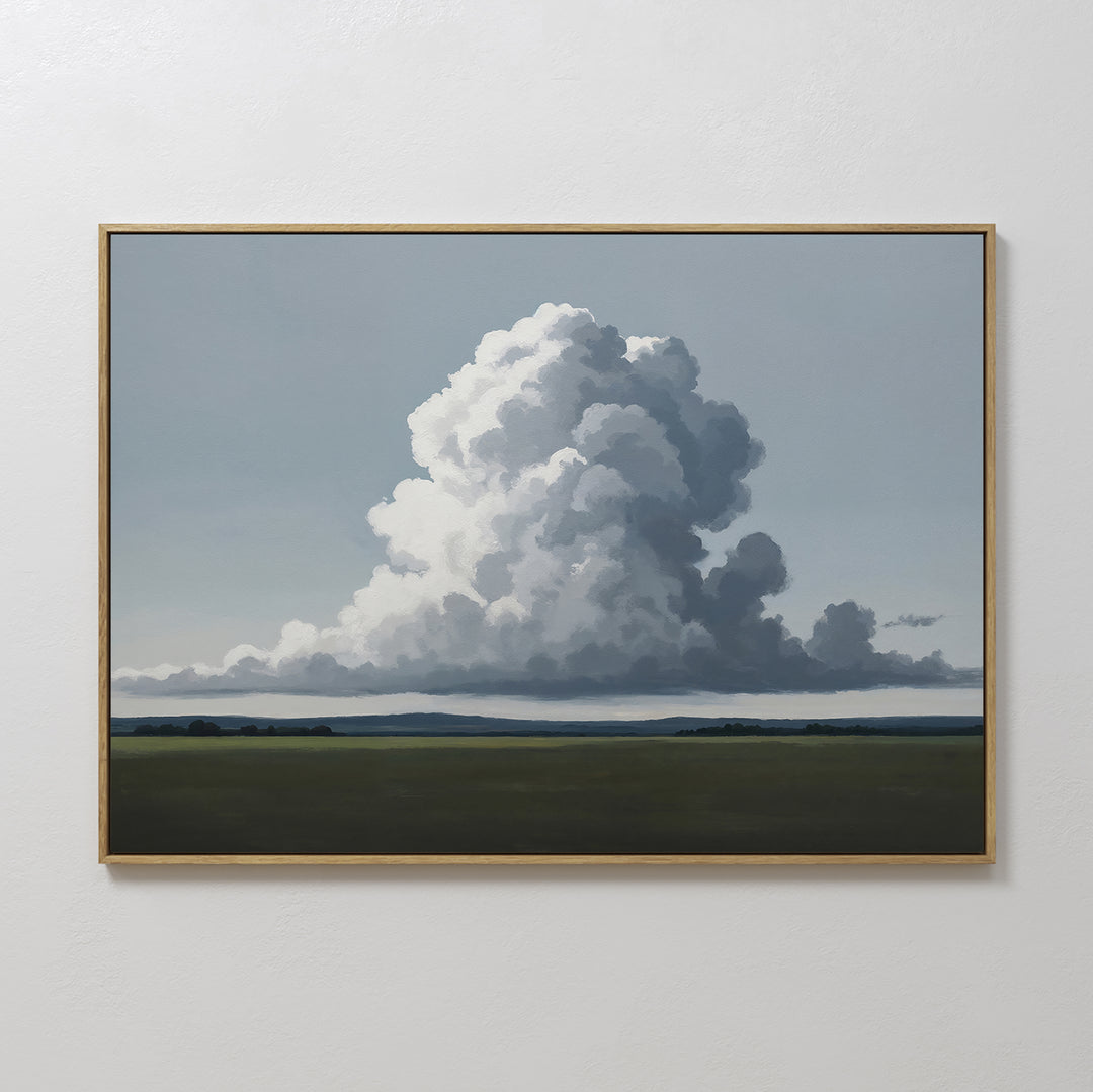 Uplifted Sky Canvas Art features a vast grassy field and a billowing white cloud in a blue sky. This minimalist wall art brings tranquility to modern bedrooms and looks stunning on any plain white wall.