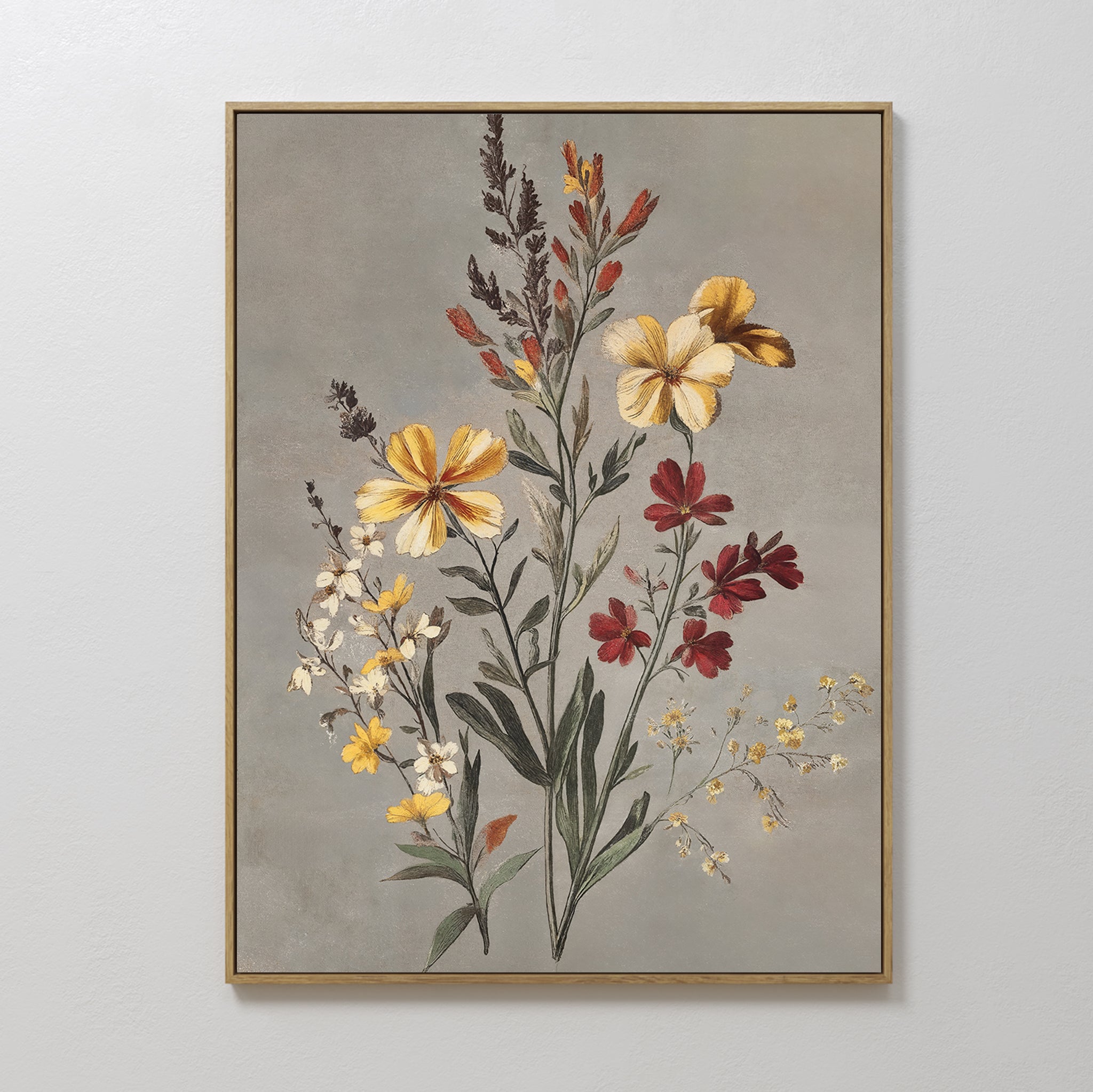 The Velvet Petals Canvas Art features yellow, red, and white wildflowers with green stems on a muted gray background—a perfect vintage-inspired decor piece for display on a light-colored wall.