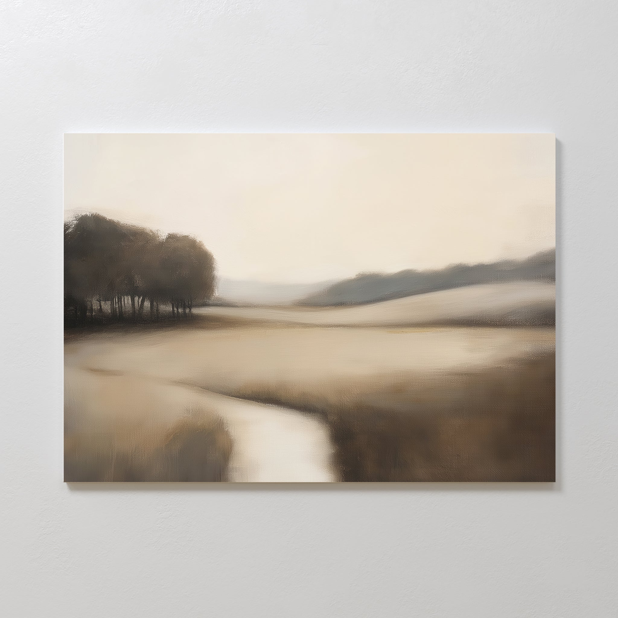 The Vintage Horizon Canvas Art – Horizontal showcases a soft, muted landscape with a winding stream, open fields, distant hills, and trees in beige and brown tones—perfect for serene bedroom decor. Displayed on a plain white wall.