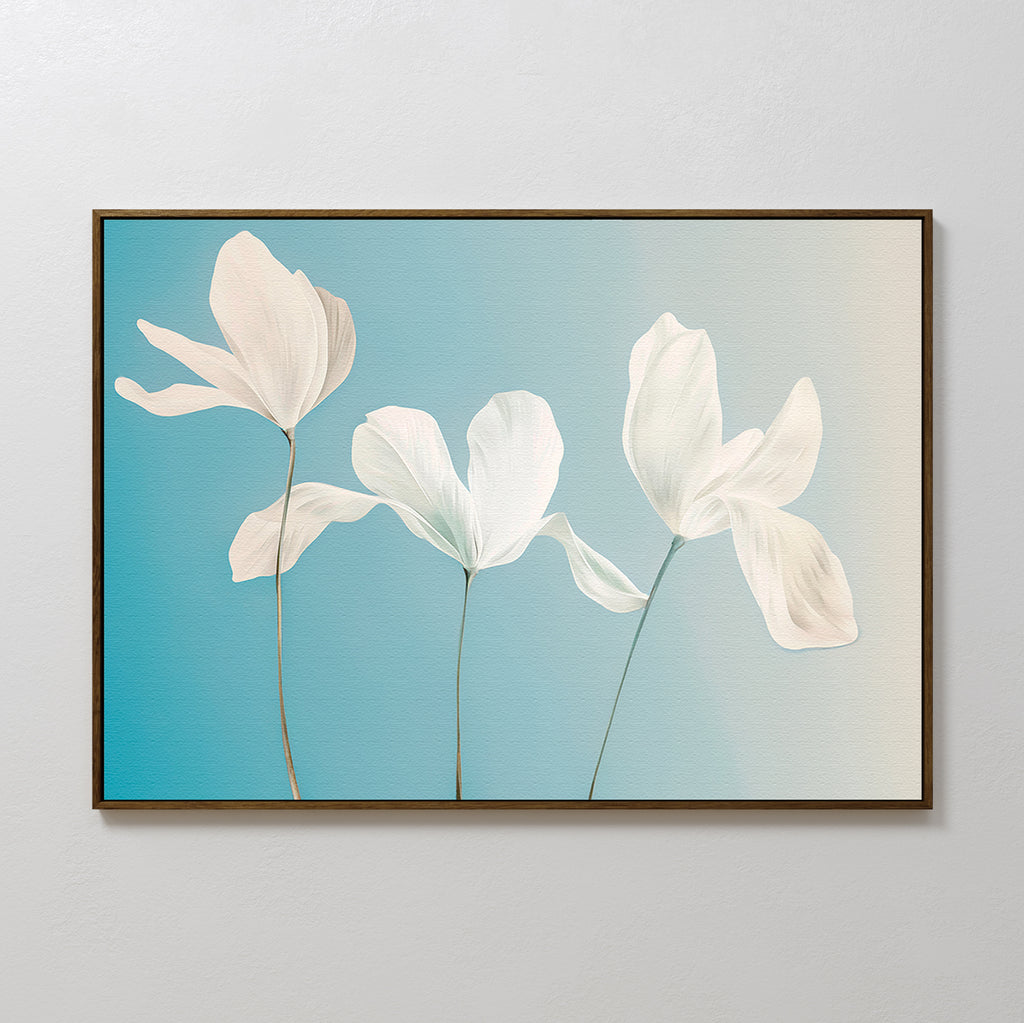 Stellar Flora Abstract Canvas Art: A framed minimalist piece with three delicate white flowers on long stems set against a soft blue gradient, ideal for enhancing your living room decor.