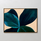 The Deep Navy Abstract Canvas Art features large, overlapping dark green and blue leaves on a beige background, creating striking minimalist wall art perfect for adding a modern touch to any white wall.