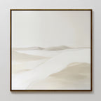 Misty Vale Abstract Canvas Art features soft, rolling sand dunes in neutral beige and white on a pale backdrop, creating a calm, minimalist desert landscape—perfect as serene bedroom wall decor.