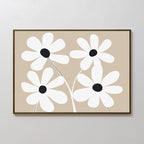 White Blooms Canvas Art features four white flowers with black centers and slender stems on a beige backdrop, framed in brown—a minimalist, modern botanical print that complements any space.