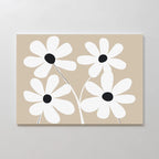 White Blooms Canvas Art features four minimalist white flowers with black centers and thin stems on a beige background, perfect for displaying on a white wall.
