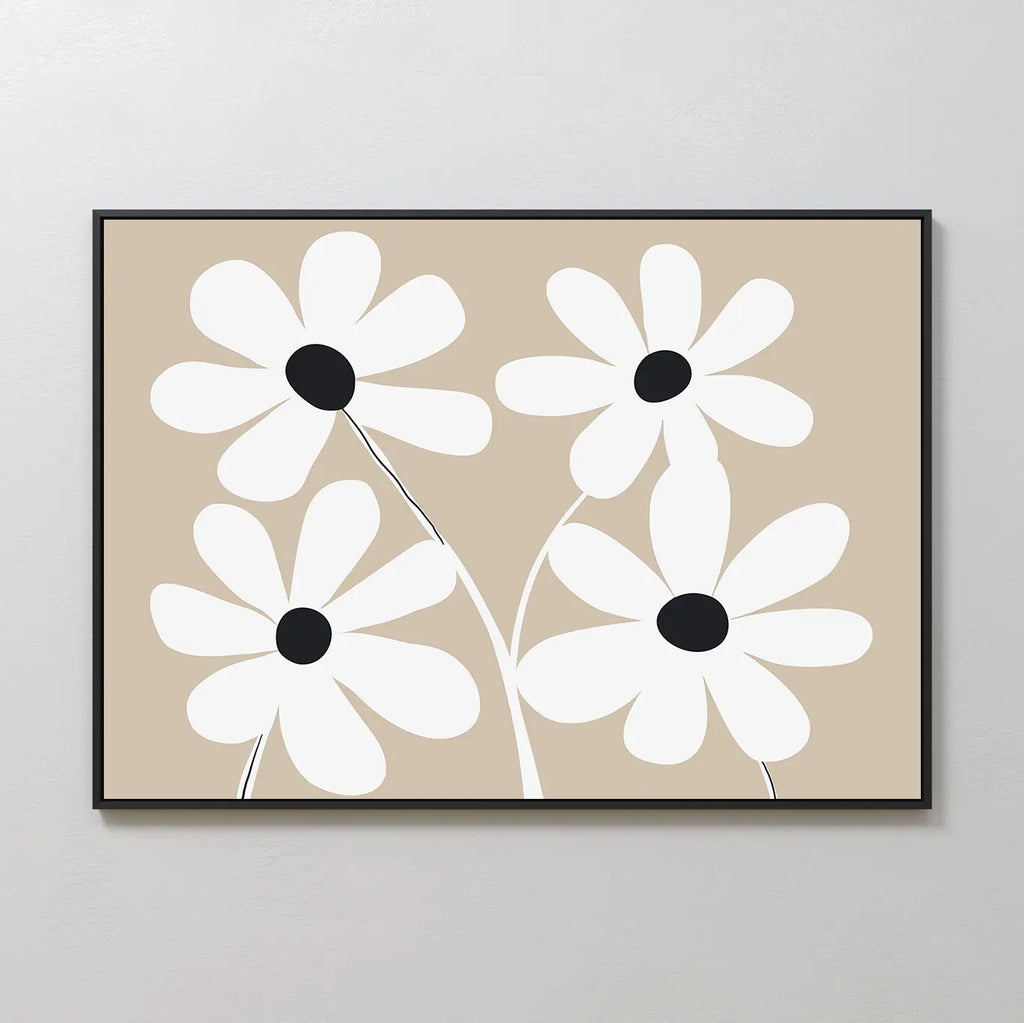 White Blooms Canvas Art: Minimalist wall art with four white flowers, black centers and long stems on a beige background, framed in black.