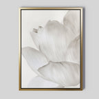 White Blossom Abstract Canvas Art showcases a close-up of a delicate pale flower on a light background. Its gold frame with a thin black inner edge adds elegance, making it perfect for minimalist living room decor.