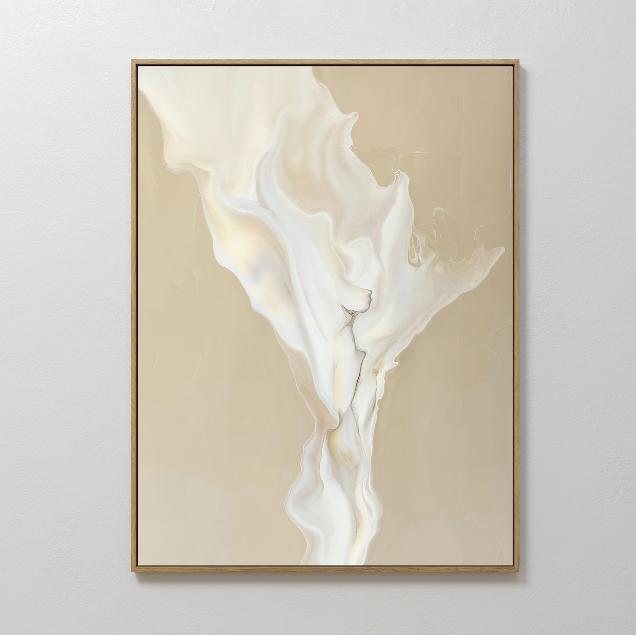 The White Flame Abstract Canvas Art features swirling beige, cream, and white patterns reminiscent of marble. Framed in thin light wood, it adds a minimalist touch to living room decor when displayed on a light gray wall.