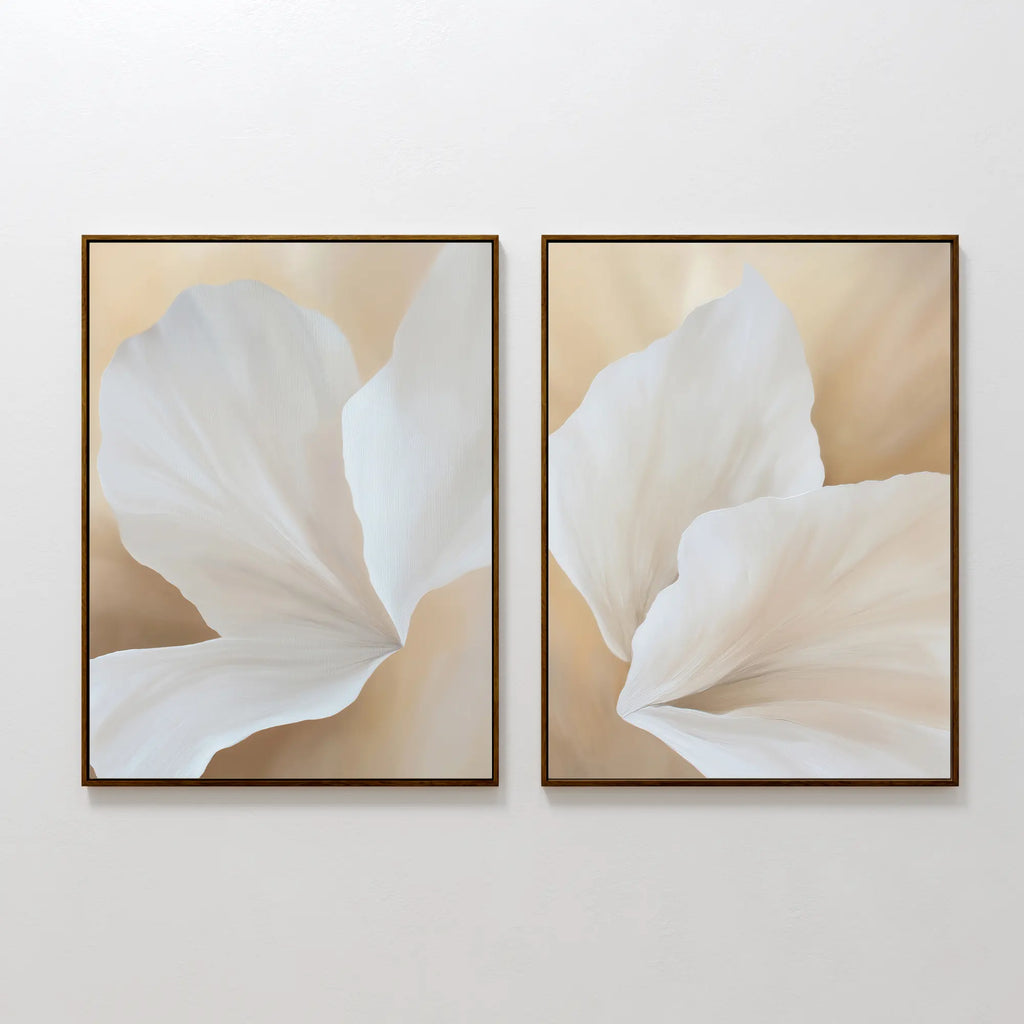 The White Flora Set of 2 features side-by-side framed art prints with close-up soft white flowers on a beige background, adding Nordic Park elegance and minimalist charm to any space.