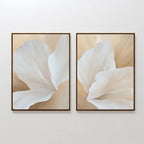 The White Flora Set of 2 features side-by-side framed art prints with close-up soft white flowers on a beige background, adding Nordic Park elegance and minimalist charm to any space.