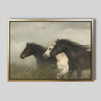 The Wild Current Canvas Art showcases three horses—two dark brown and one white—galloping through a misty field with blurred grass and flowers, making it perfect minimalist wall art for any space.
