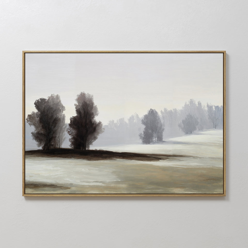 Winter Dusk Canvas Art features a serene, misty landscape with clusters of trees and rolling hills in muted tones, offering minimalist, calming neutral wall decor against a pale sky.
