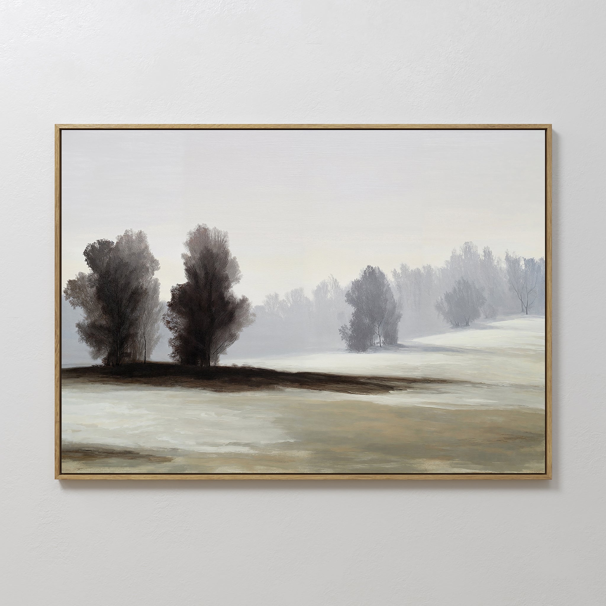 Winter Dusk Canvas Art features a serene, misty landscape with clusters of trees and rolling hills in muted tones, offering minimalist, calming neutral wall decor against a pale sky.