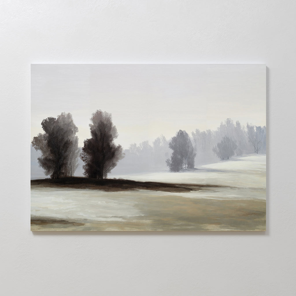 Winter Dusk Canvas Art features a misty landscape with snowy hills, clusters of trees, and a pale gray sky—ideal minimalist wall art for serene, neutral decor.