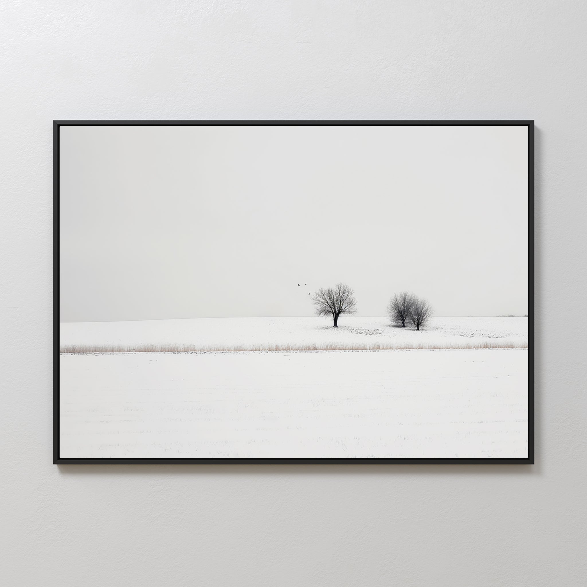 Winter Silence Canvas Art captures a minimalist snow-covered landscape with two leafless trees and three birds beneath a pale sky. This serene scene, framed simply, makes perfect minimalist wall art for any space.