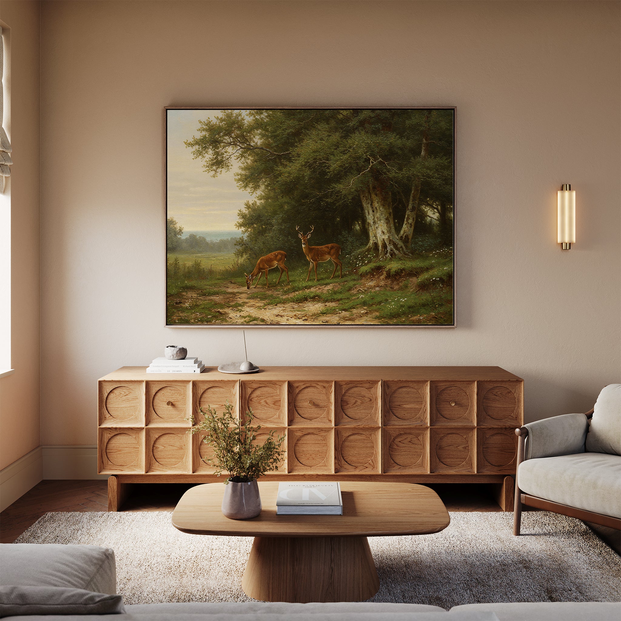 A cozy living room features a wooden sideboard, coffee table, sofa, and the Woodland Watch Canvas Art with deer and trees above the sideboard. Soft lighting and neutral tones create a calm, nature-inspired atmosphere.