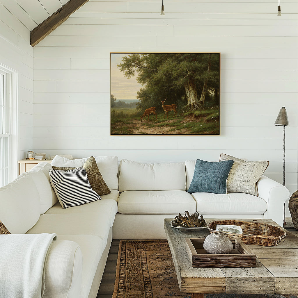 A cozy living room with a white sectional sofa, assorted pillows, and a rustic wooden coffee table. The shiplap wall showcases the Woodland Watch Canvas Art—a perfect nature-inspired accent. Sunlight fills this inviting, restful space.