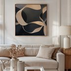 A modern living room with a beige sofa, neutral cushions, a side table with a lamp, dried flowers in a vase, and the Quiet Division Abstract Canvas Art featuring flowing shapes in black, beige, and cream tones for modern elegance.