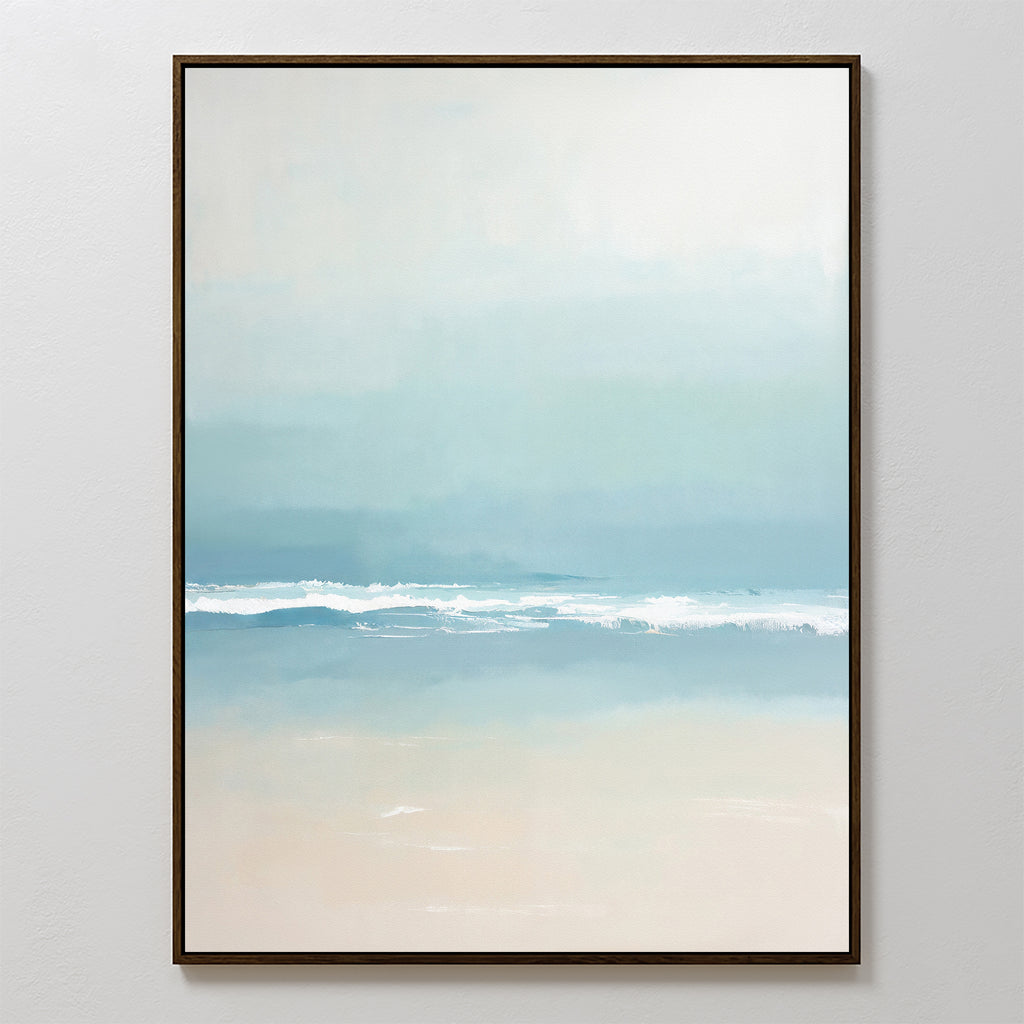 Airy Shore Canvas Art - Vertical features a minimalist seascape in soft blue, white, and sandy beige tones with gentle waves, framed in a slim dark frame. This coastal print adds tranquil seaside vibes to Nordic Park wall art decor.