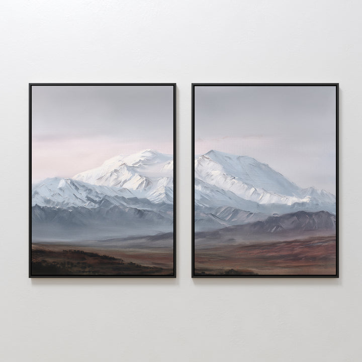Alpine Majesty - Set of 2 features framed mountain canvas prints hung side by side, showing snow-capped peaks above brown and green fields beneath a cloudy sky, creating a seamless Nordic Park-inspired landscape.
