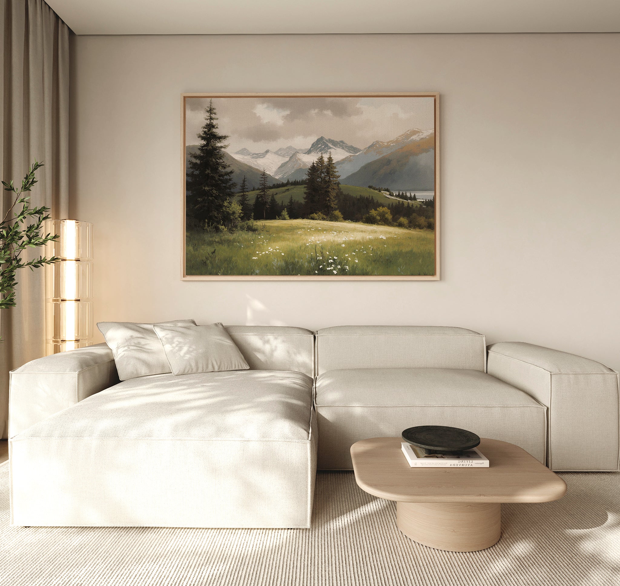 A modern living room with a beige sectional, light wood coffee table, potted plant, and the Alpine Meadow Canvas Art - Horizontal above the sofa, creating a serene Nordic Park vibe.