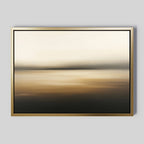 Amber Fields Canvas Art - Horizontal showcases a framed abstract painting with soft, blurred beige, brown, and amber tones, evoking a serene sunrise landscape on a light gray wall.