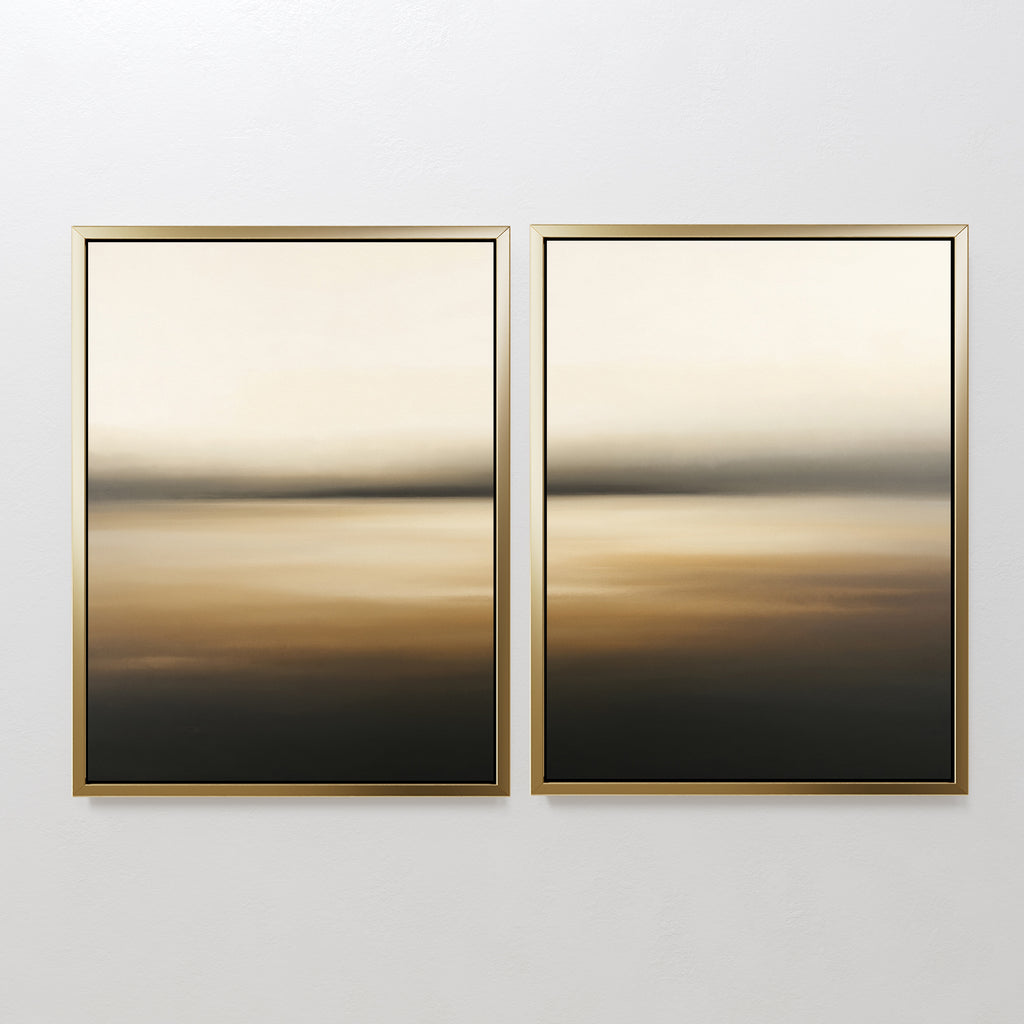 Amber Fields - Set Of 2 features framed abstract prints with soft horizontal gradients in cream, beige, brown, and black, creating a serene Nordic park vibe. These atmospheric landscape artworks are displayed side by side on a white wall.