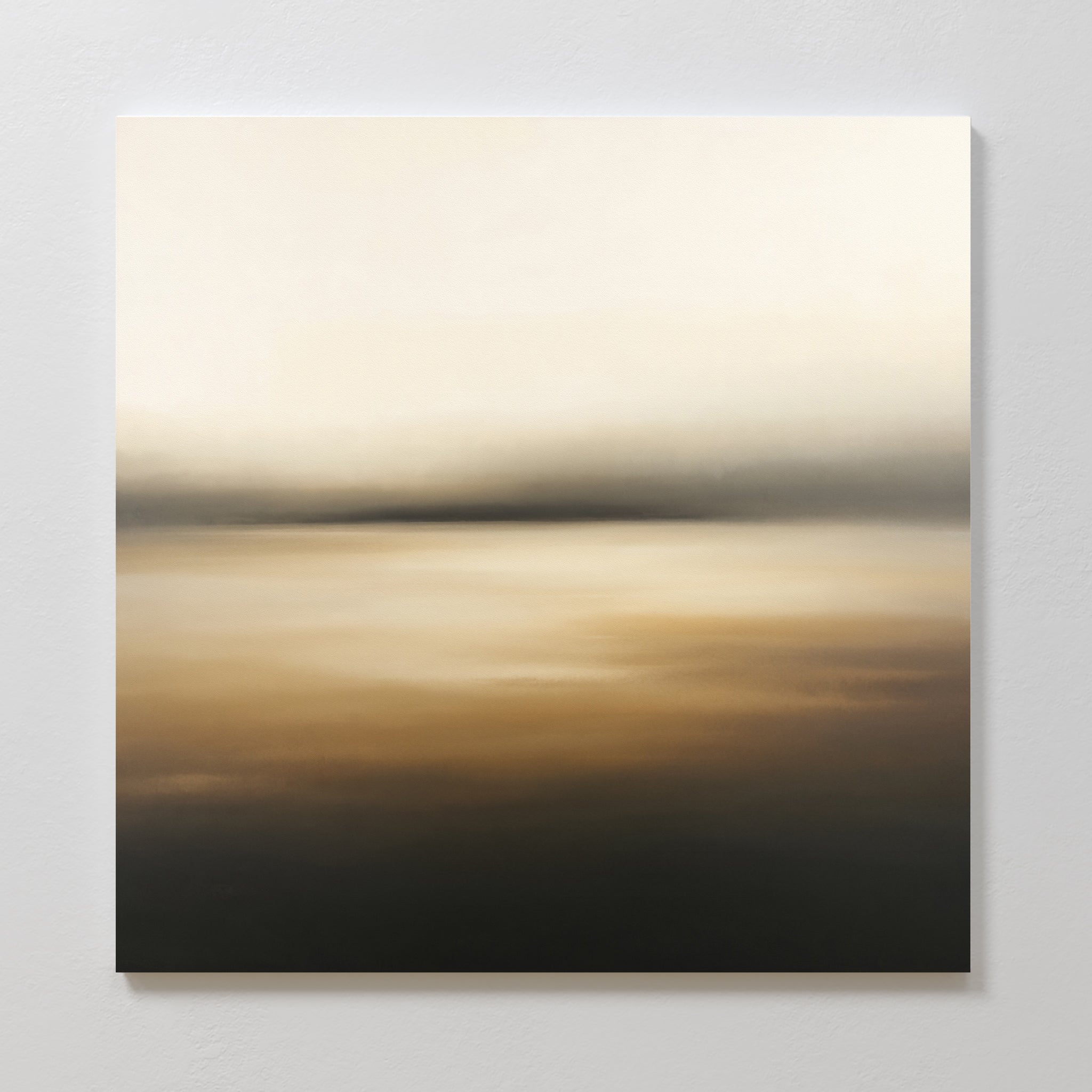 The Amber Fields Canvas Art - Square features soft gradients of beige, gold, brown, black, and amber tones. This tranquil landscape print evokes a peaceful Nordic park with smooth color blends and an atmospheric, misty effect.
