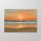 The Amber Horizon Canvas Art - Horizontal showcases a serene beach at sunset, with orange and pink clouds, gentle waves, and the sun reflecting on wet sand.