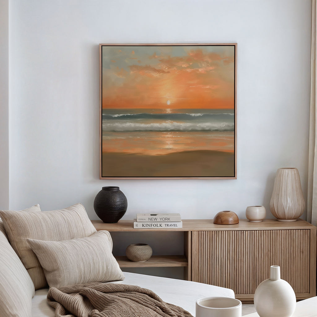 A cozy living room with neutral tones, a wooden console, ceramic vases, and the Amber Horizon Canvas Art - Square above. Books and minimalist decor complete this tranquil Nordic Park-inspired space.