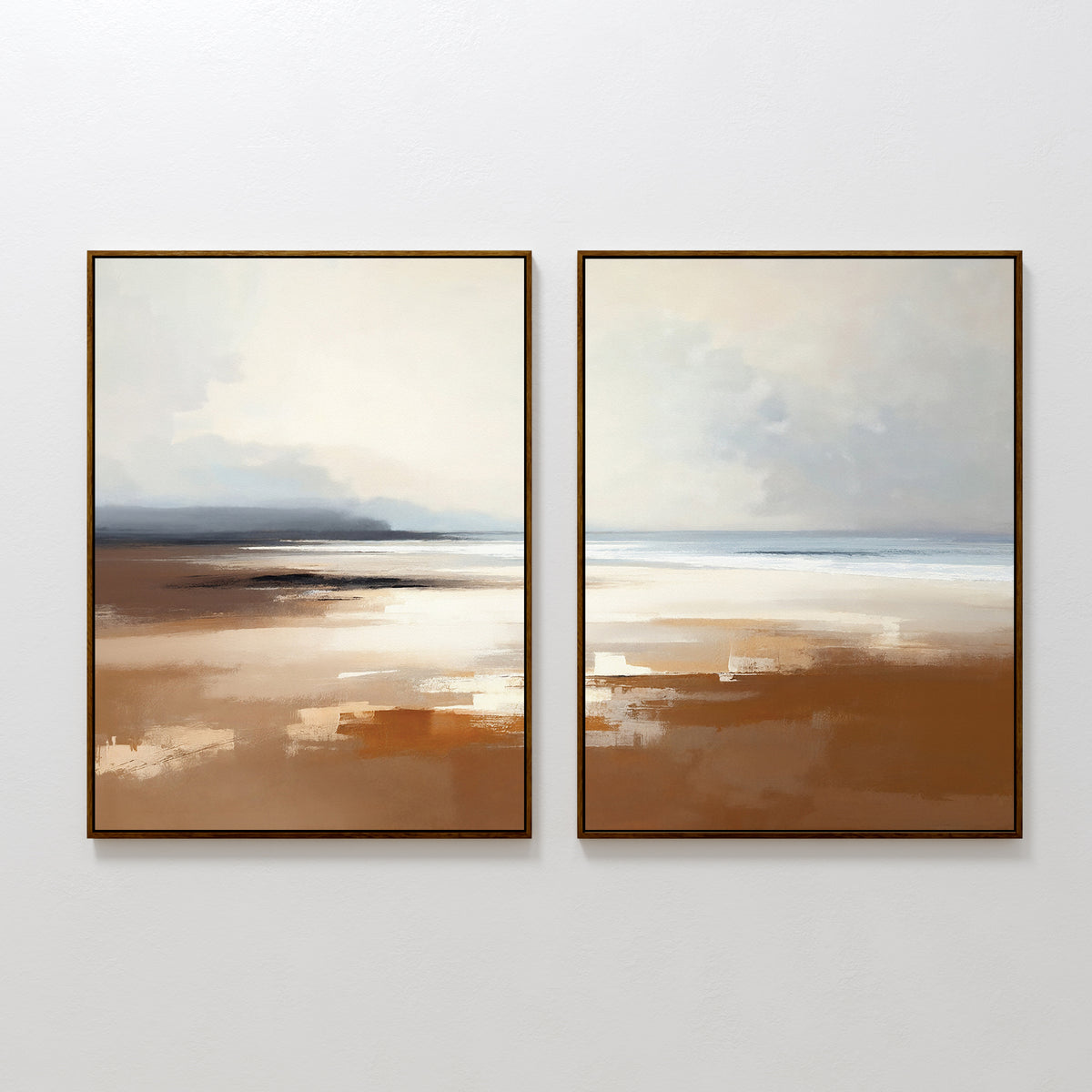Amber Shore - Set Of 2 features two framed abstract prints in soft brown, beige, white, and blue tones, capturing a peaceful beach scene—ideal tranquil wall art that evokes sand, sky, and calm waters.