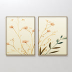 The Autumn Botanicals - Set of 2 features framed prints with minimalist beige flowers and green leaves, adding botanical elegance to a light wall with their delicate, neutral-toned illustrations.